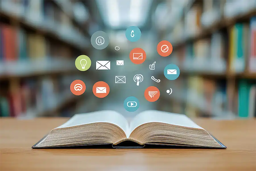 Maximizing Your Book's Potential- A Guide to Effectively Using Your Gathered Reviews for Marketing open book with floating icons of email, chat, and social media platforms